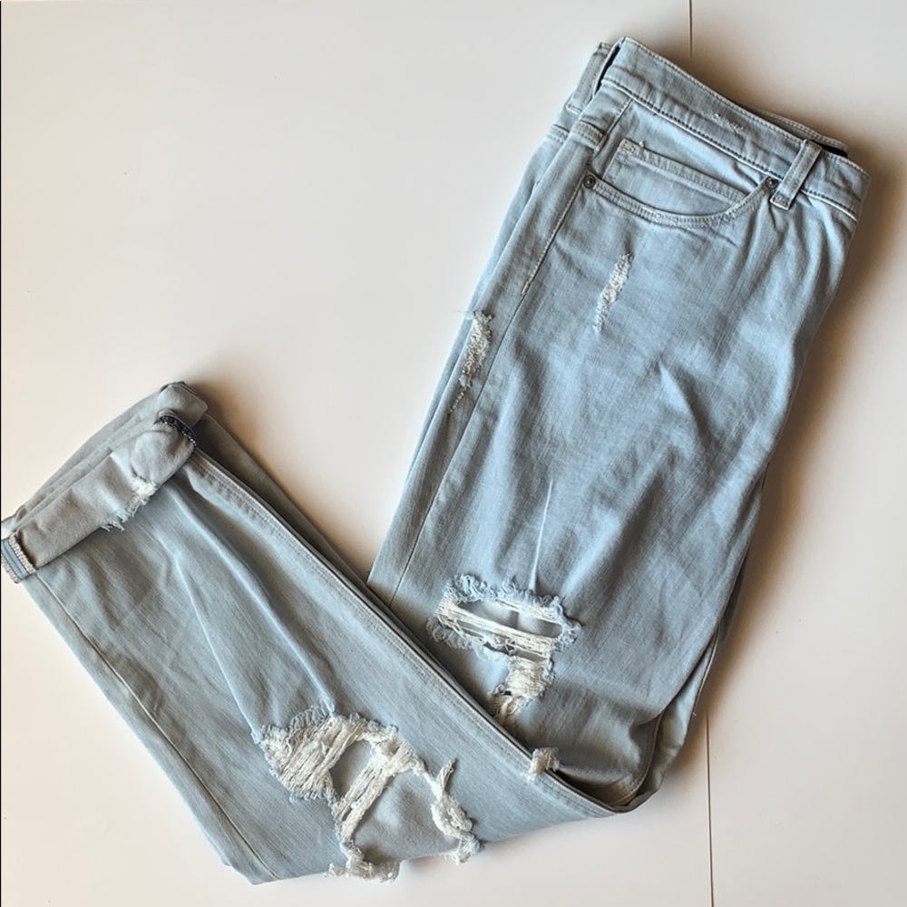 High waisted distressed “girlfriend” jean